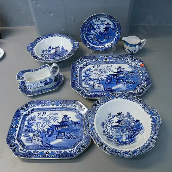 Burleigh "Willow" pattern items - 2 ashetts, 2 serving bowls, gravy boat & saucer and an odd blue & white creamer