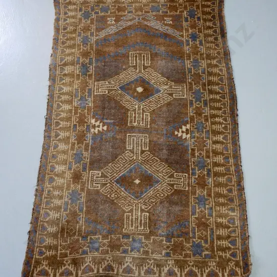 hand-knotted wool floor rug - very faded - blue and brown, wear to restitched ends L-1220 W-730