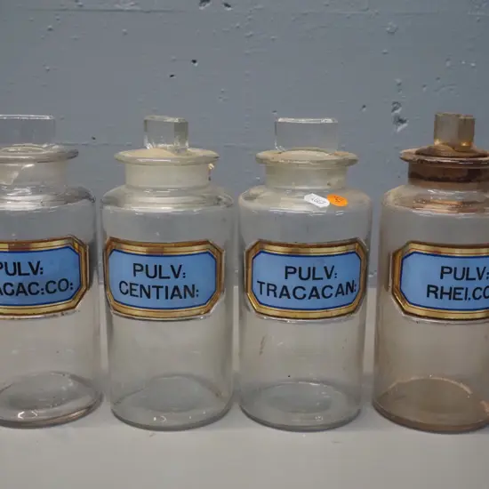 4 stoppered apothecary bottles with labels - some stoppers stuck - H-220 D-90