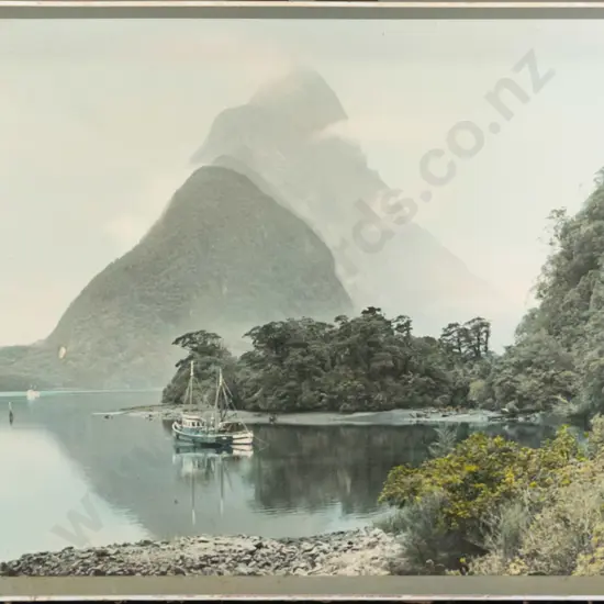 framed Whites Aviation hand coloured photograph "Milford Sound" (some aging and marks) H-370 W-670
