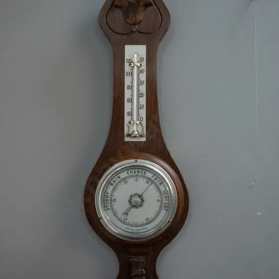 vintage oak-cased wall thermometer-barometer, marked Made in England H-450