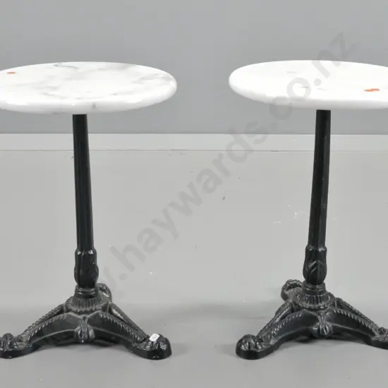 pair of small side tables with black painted cast iron bases, white marble tops H-430 D-300