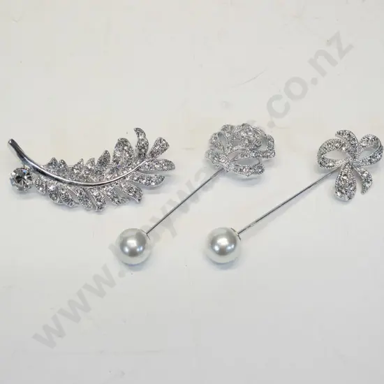3 costume brooches