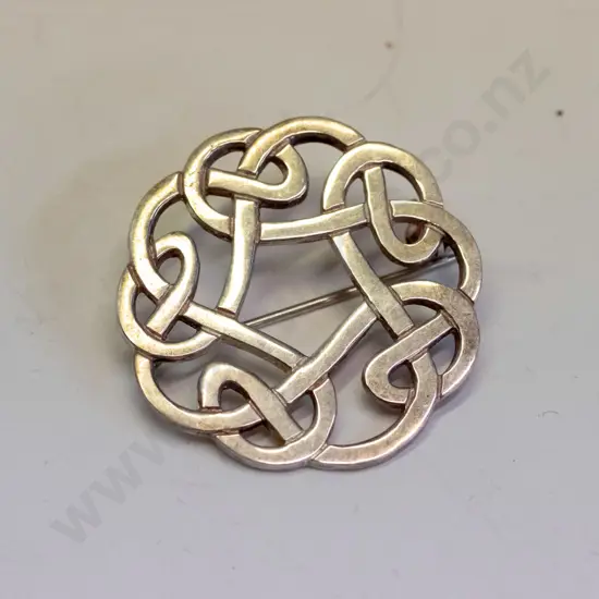 silver brooch marked