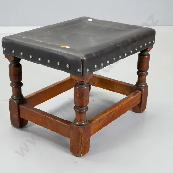 small oak turned leg stool having studded leather top and carved pattern H - 320, W- 420, D -310