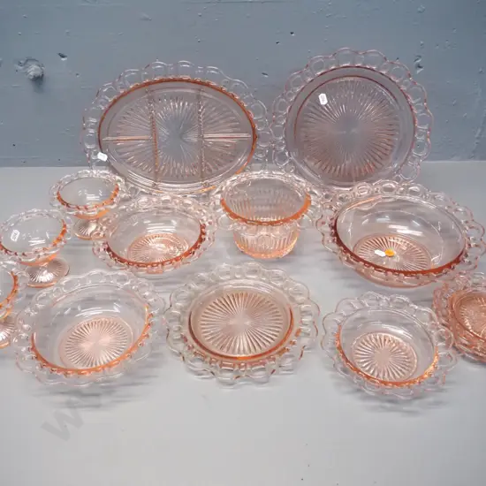 14 pieces of moulded pink pierced-rim depression glass. Largest bowl is D-240, larger oval plate is L-320