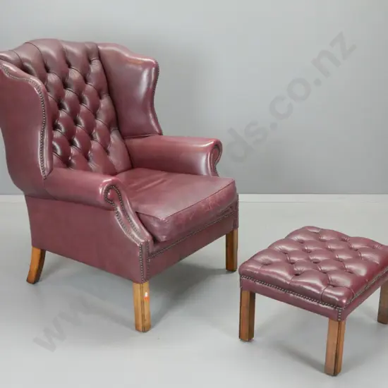 traditional deep-button & studded burgundy leather wing chair & foot-stool. Some age wear to leather H1020 W800 D880