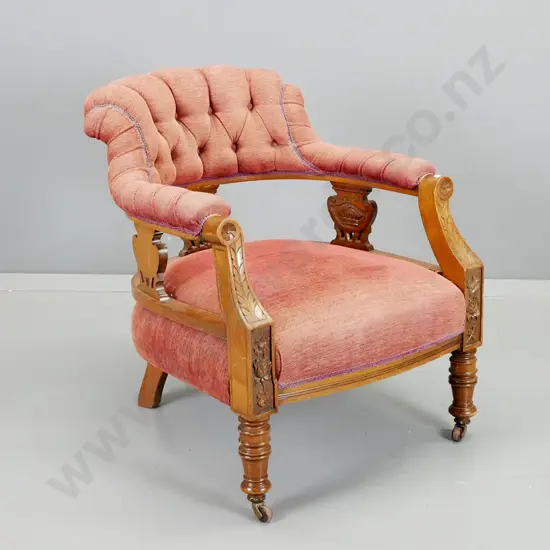 Edwardian mahogany tub lounge chair w/ carved detail, textured tweed fabric, deep-button back with cording, on original