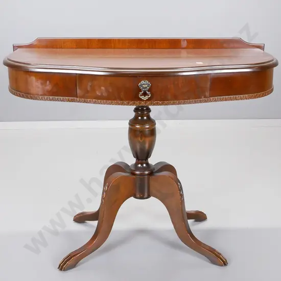 reproduction walnut serpentine-front side table with drawer on turned vase pedestal having