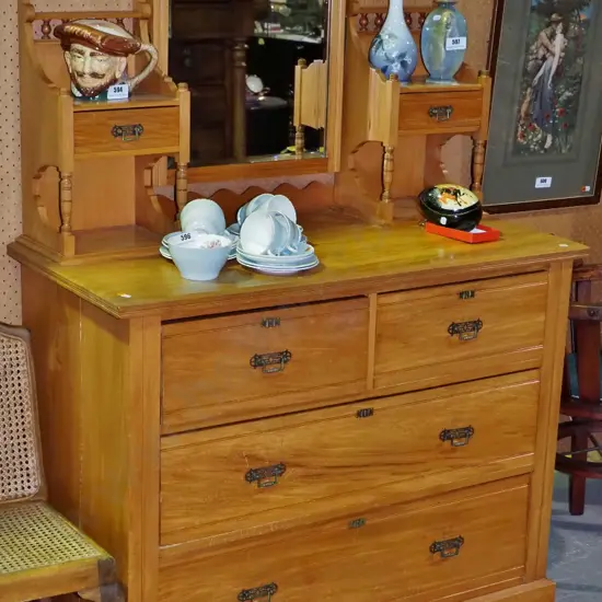 vintage rimu dressing table with bevelled mirror, 2 jewellery drawers and 4 lower drawers with original drop handles,