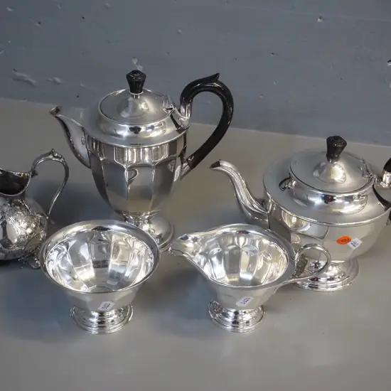 Sheffield silver plated tea pot, coffee pot H200 W190, cream & sugar, and an ornate milk jug