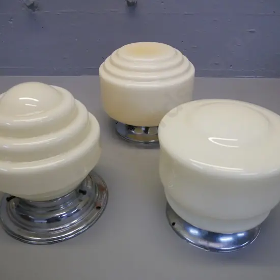 three cream deco lightshades, two with ribbed decoration, tallest H- 190