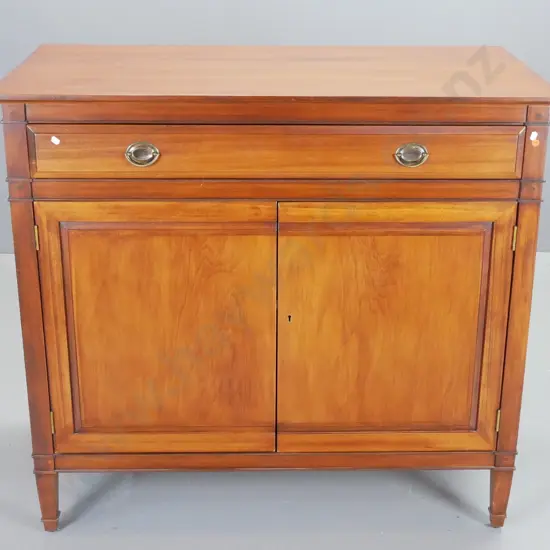 solid timber sideboard with 1 drawer, 2 doors, 2 adjustable internal shelves, escutcheon with key. H-1000 W-1100 D-565