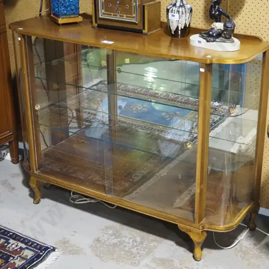 mid-century mahogany cab-leg china cabinet with rounded glazed ends, 2 sliding glass doors, 2 adjustable glass shelves &