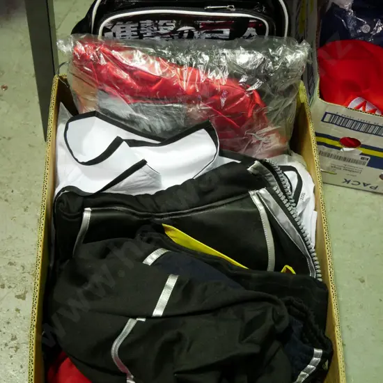 box of opened and unopened costumes