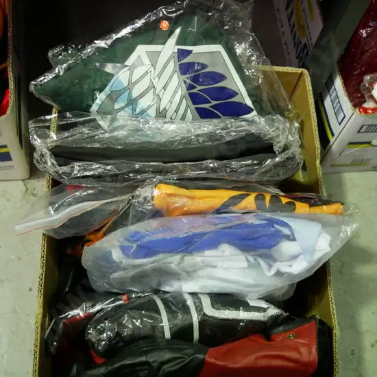 box of opened and unopened costumes