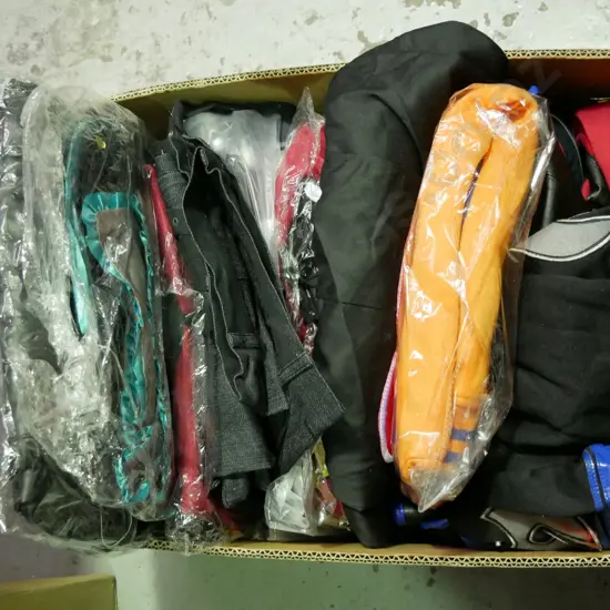 box of opened and unopened costumes