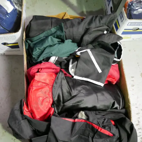 box of opened costumes