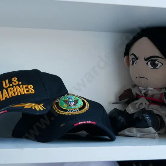 soft toy and 2 army caps