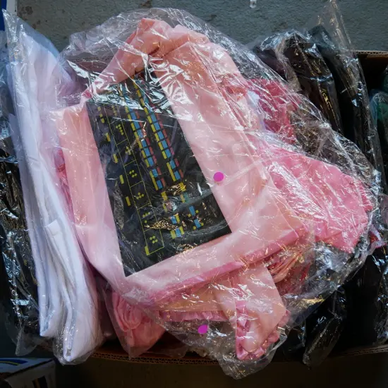 box of unopened costumes