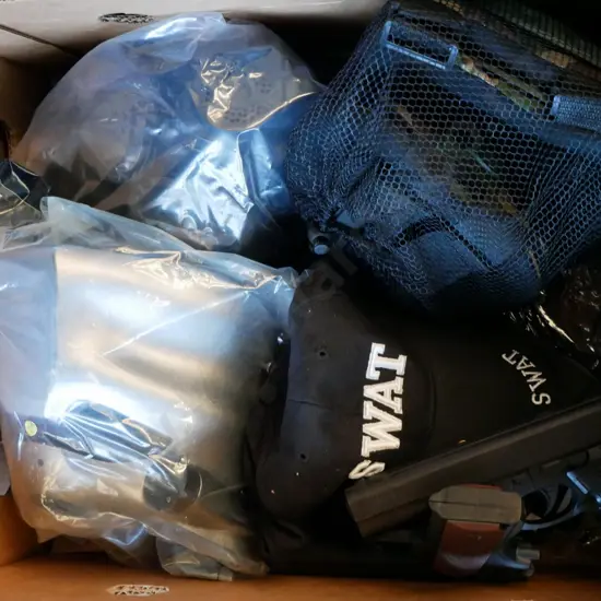 box of SWAT costume items - cap, vest, 2 masks, guns, knee pads