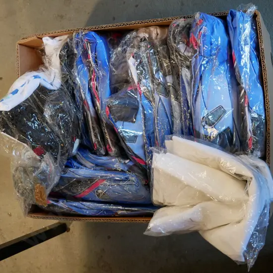 box of unopened costumes