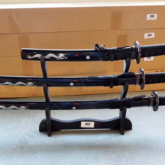 3 Japanese katana swords on a stand