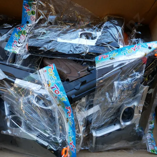 box of plastic handguns