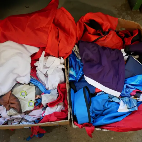 2 boxes of opened costumes - green dots