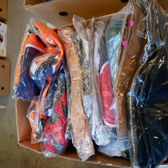 box of unopened costumes