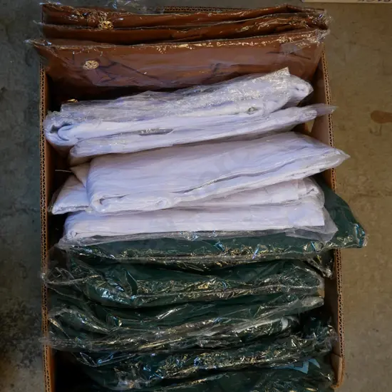 box of unopened costumes