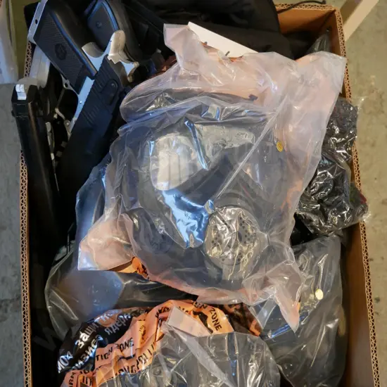 box of military style gas masks