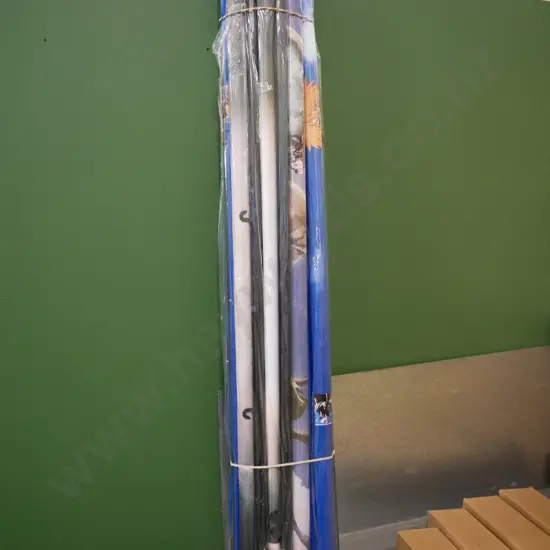 bundle of wall hanging prints on scrolls