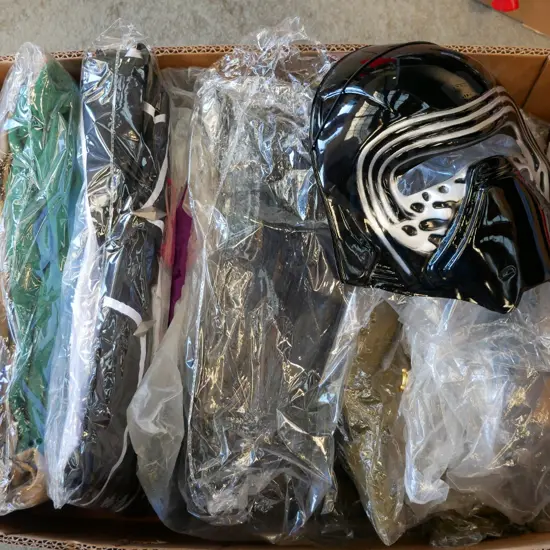 box of unopened costumes