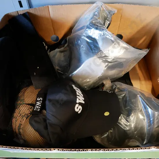 box of SWAT costume items - vests, masks, caps, etc.