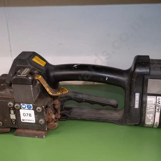 Battery powered strapping tool