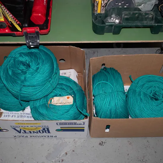 5 rolls of green rope, tied together 