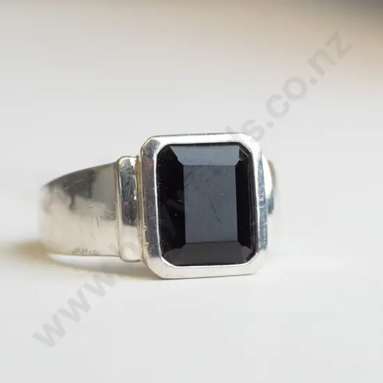 Silver ring with red square with 'happy b18th birthday james' 