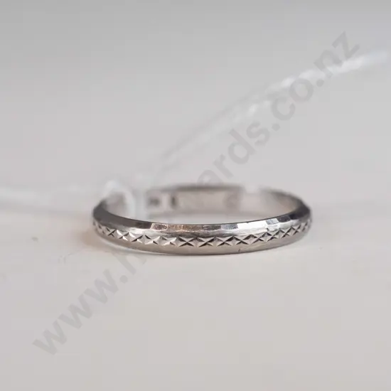 Thin silver ring - Has crosshatching designs around the band.