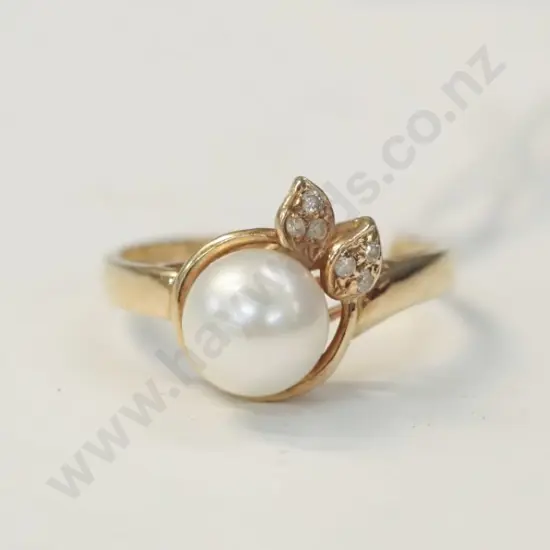 pearl & cz ring stamped 14k