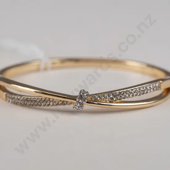 Gold entwined bangle with diamantes