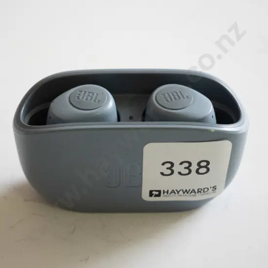 Pair of JBL ear buds in grey container