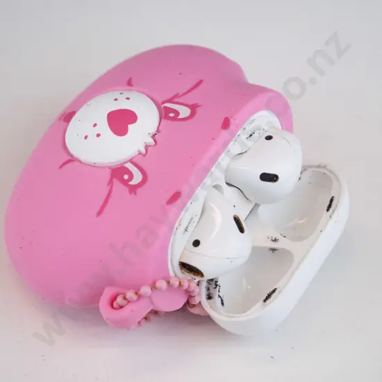 White Apple air buds in case with Pink rubbery cover