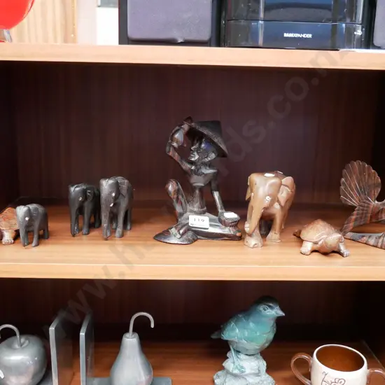 shelf; carved wooden souvenir items