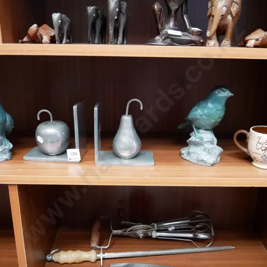 small double handled mug, bird figurines and fruit themed bookends