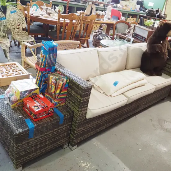 woven plastic outdoor 3 seater setee with foam cushions and glass topped coffee table