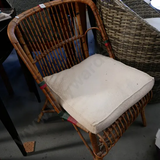 cane and bamboo patio chair with cushion