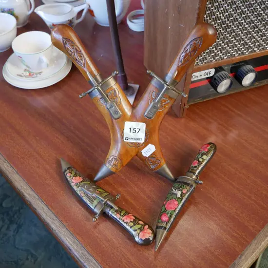 4 souvenir knives in scabbards