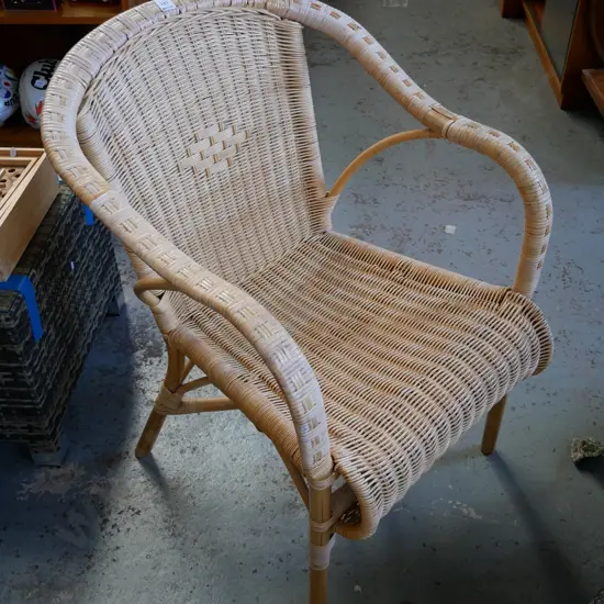 woven cane armchair