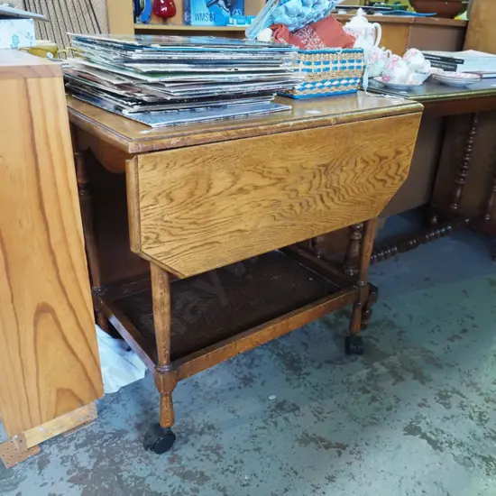oak drop side tea trolley with plastic casters